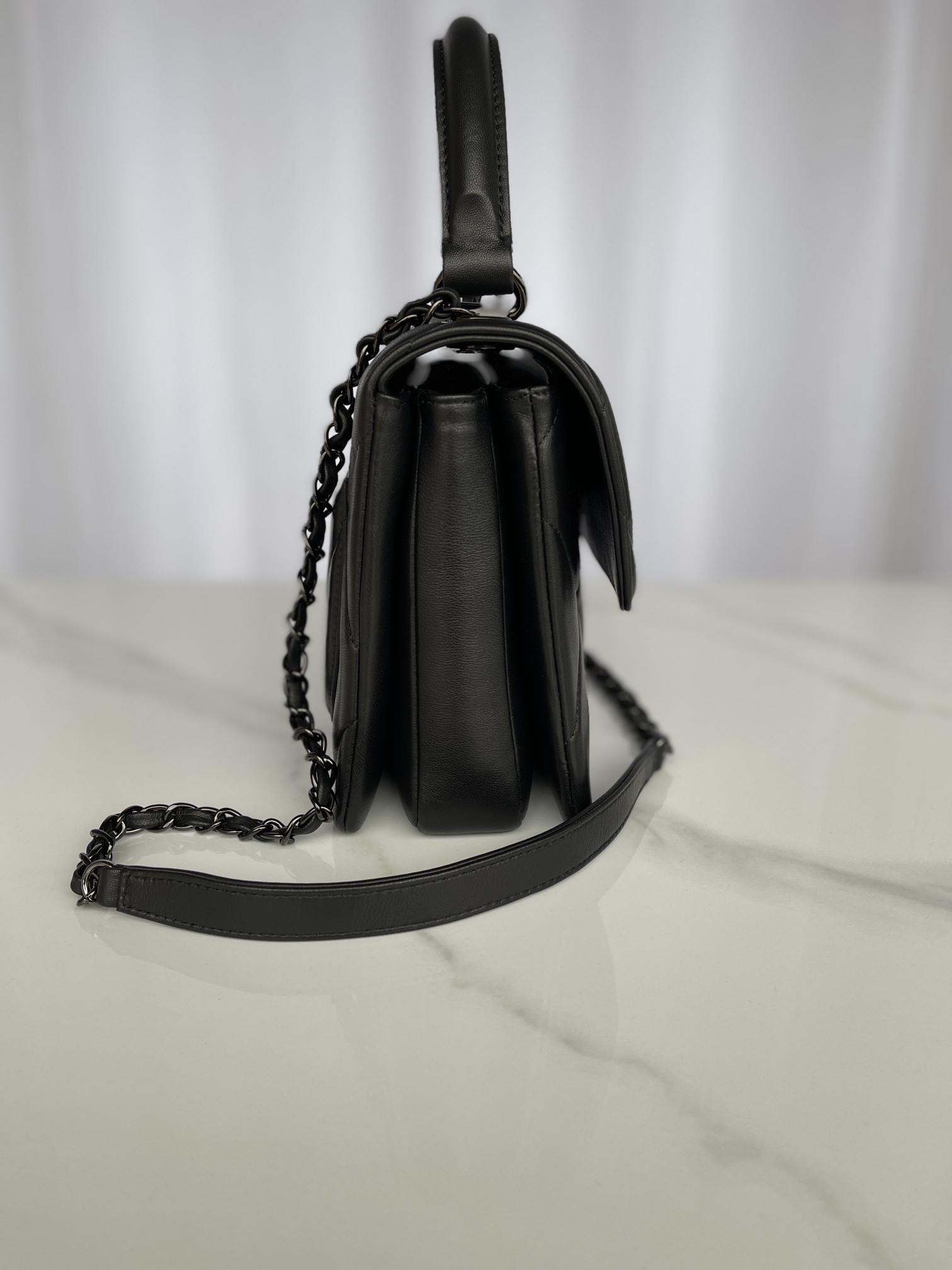 Ch*el flap bag with top handle 6.6 × 9.8 × 4.7 in