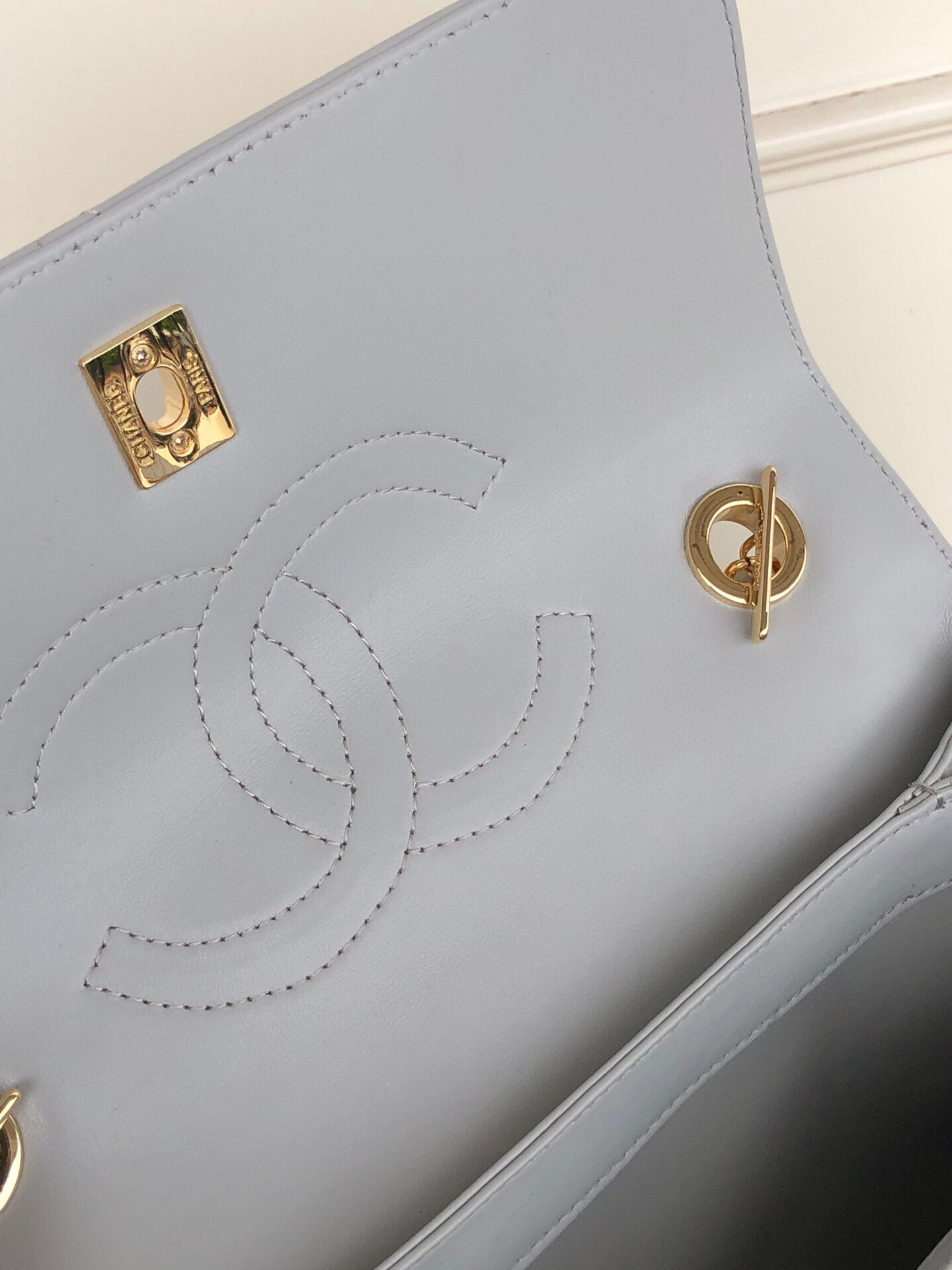 Ch*el flap bag with top handle 6.6 × 9.8 × 4.7 in