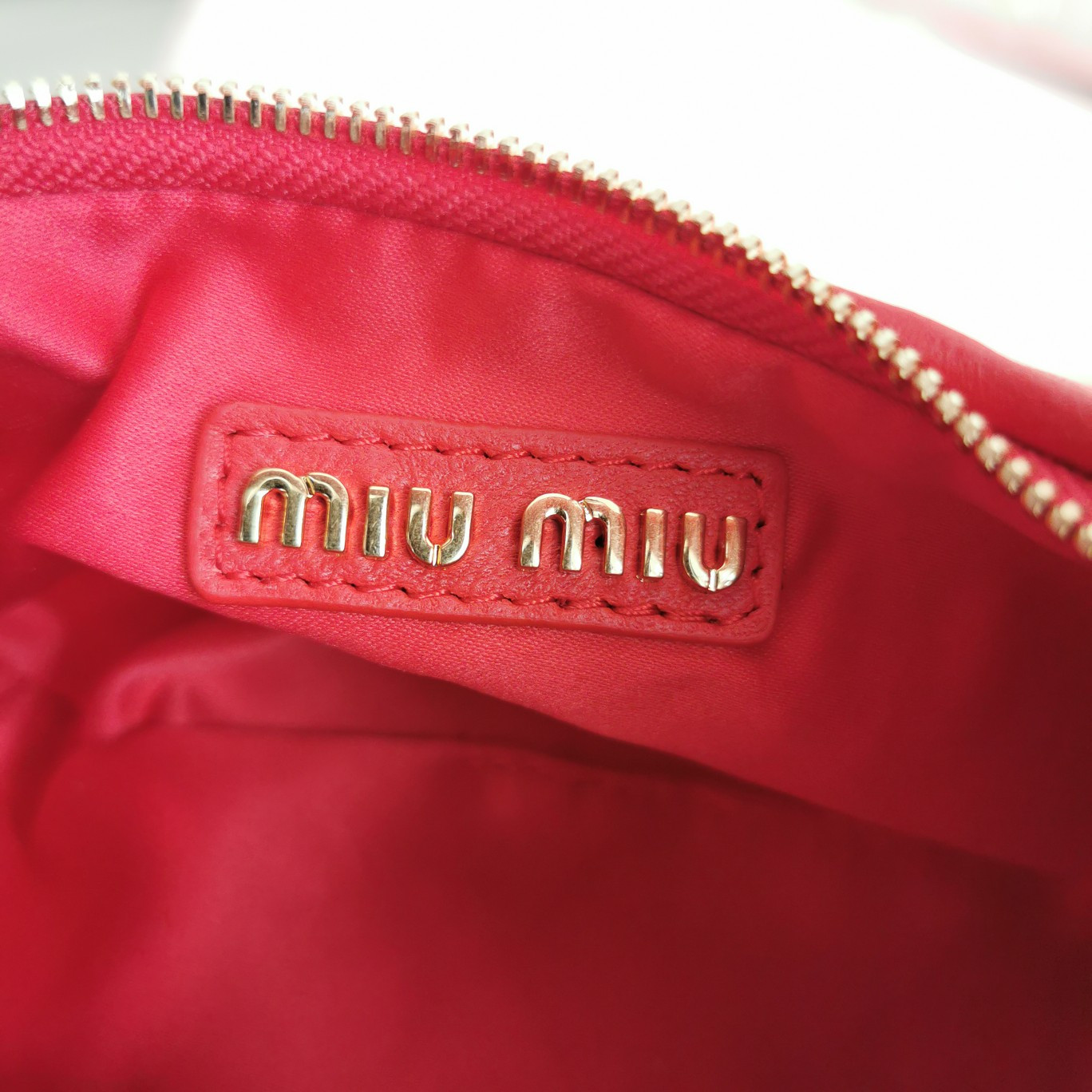 Miu Miu Wander matelassé nappa leather hobo mini-bag 14x17.5x5.5cm