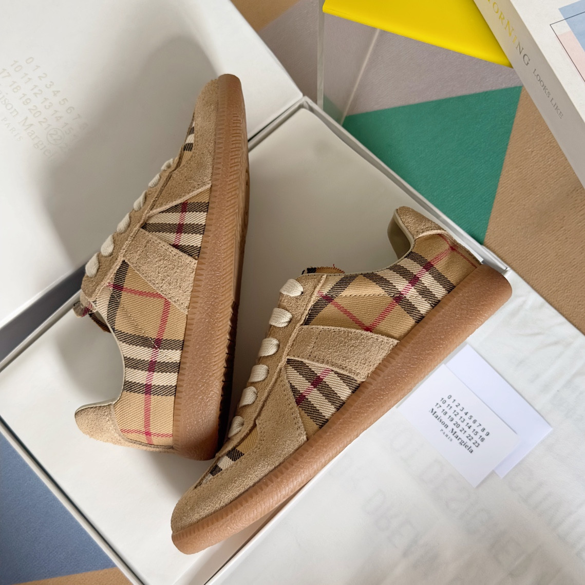 ua ma*s*n Ma*i*la mm6 sneakers